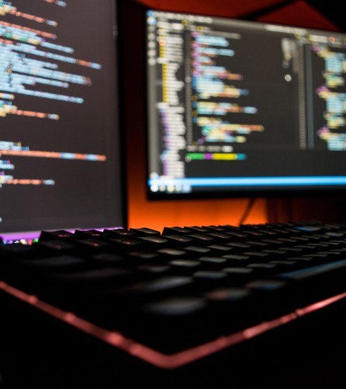 Keyboard with screens in the background