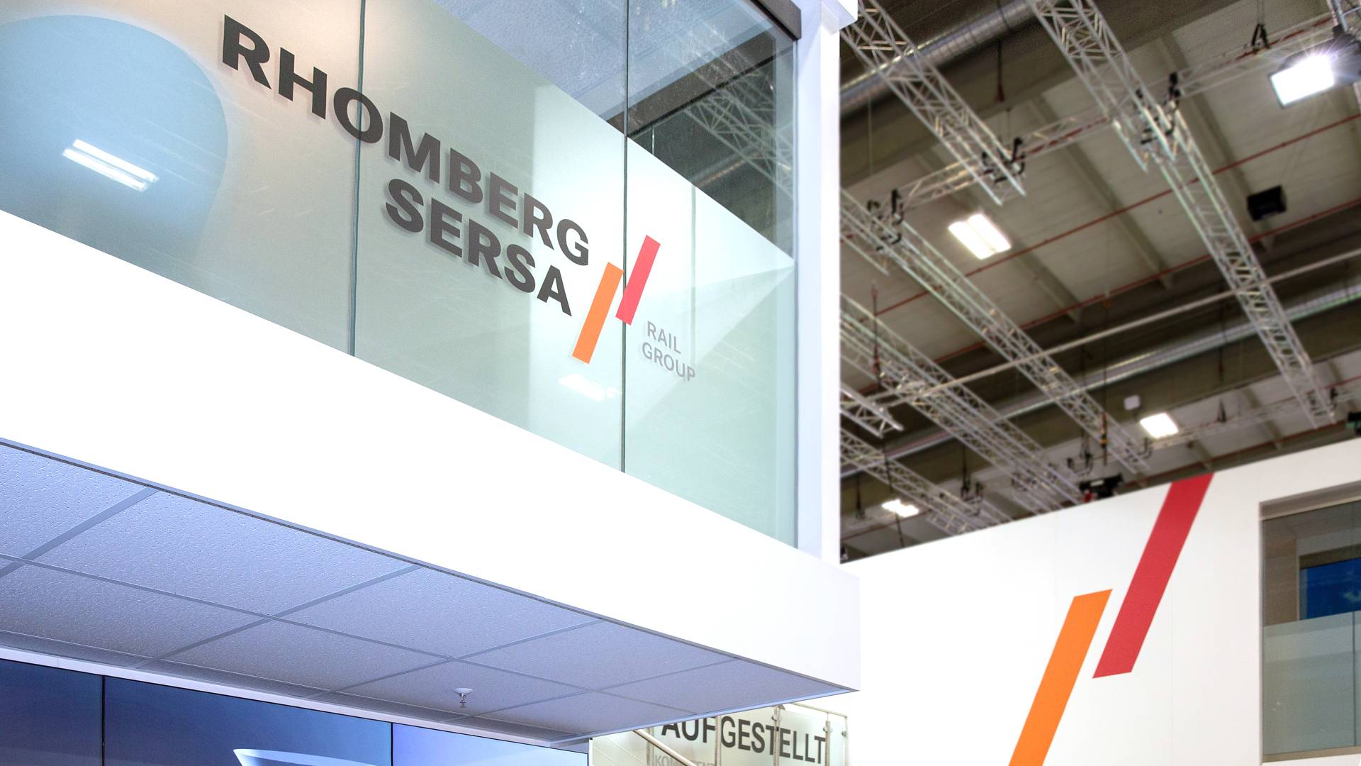 Focus on the Rhomberg Sersa logo on the trade fair stand