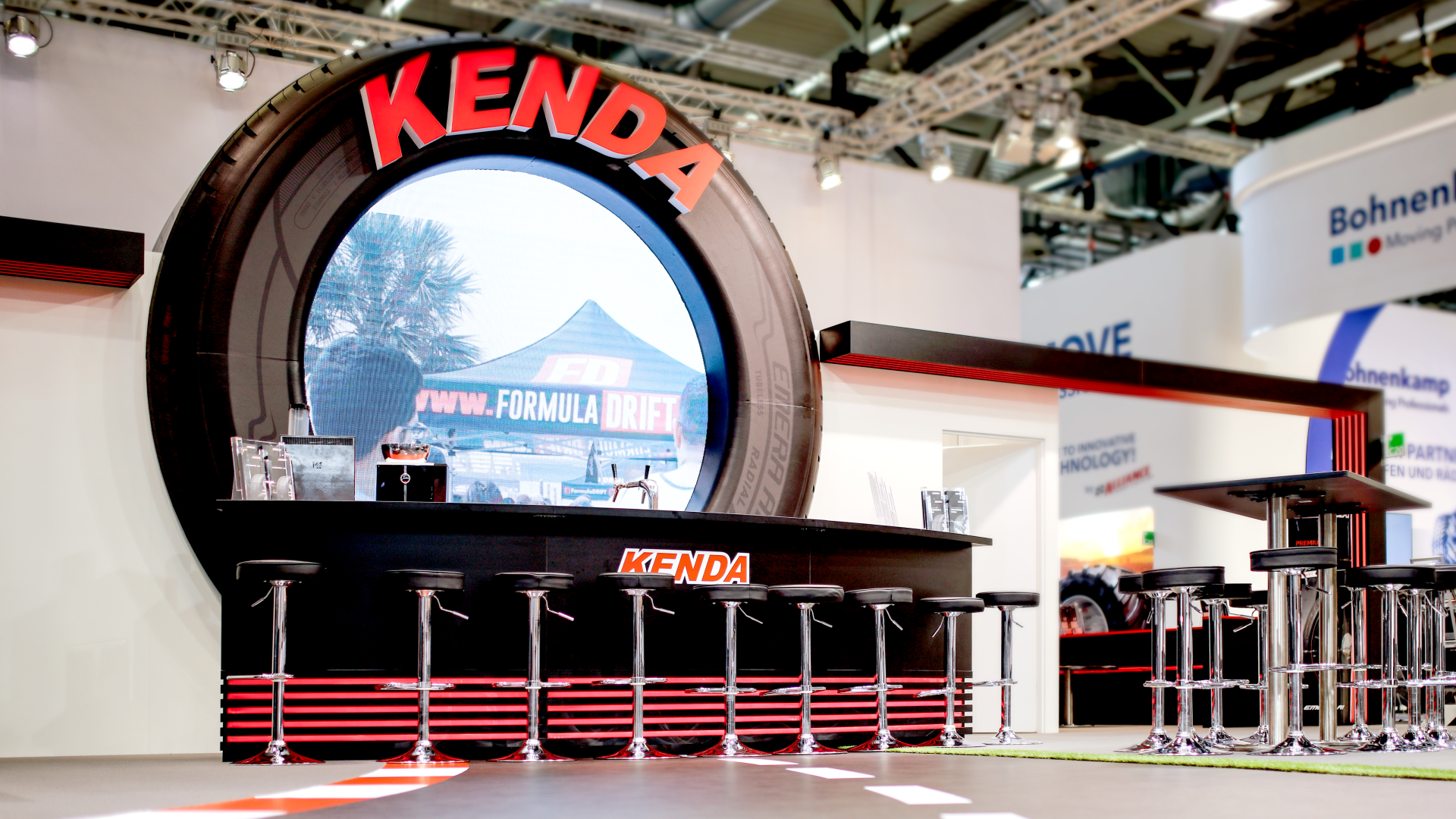 A Formula Drift pavilion, shot through a KENDA tyre
