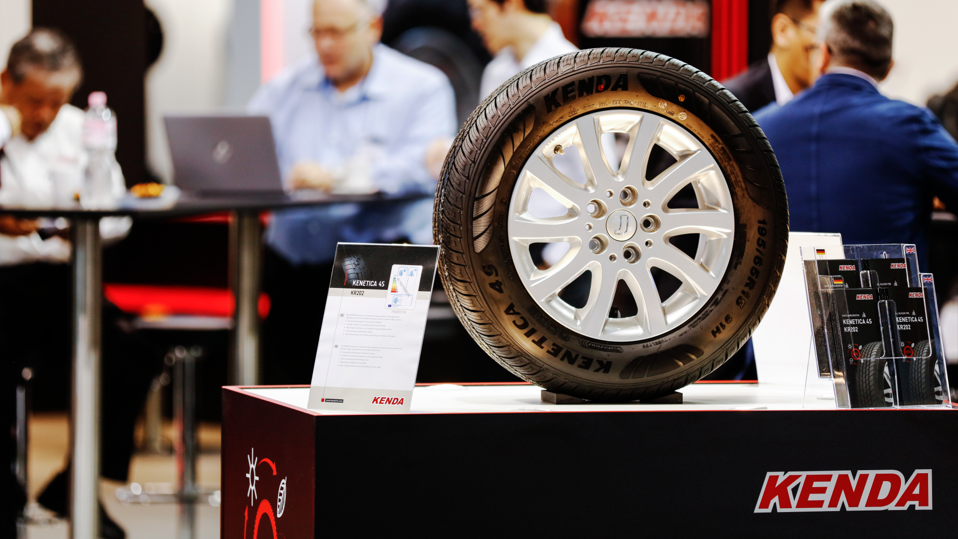 Close-up of a KENDA tyre on a podium